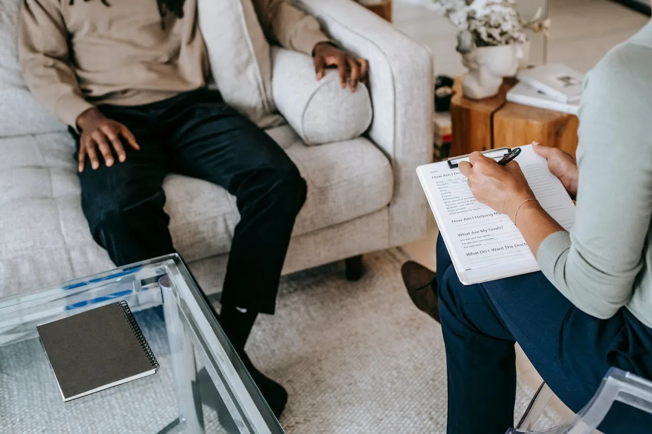 A provider taking notes during an unhurried ADHD evaluation