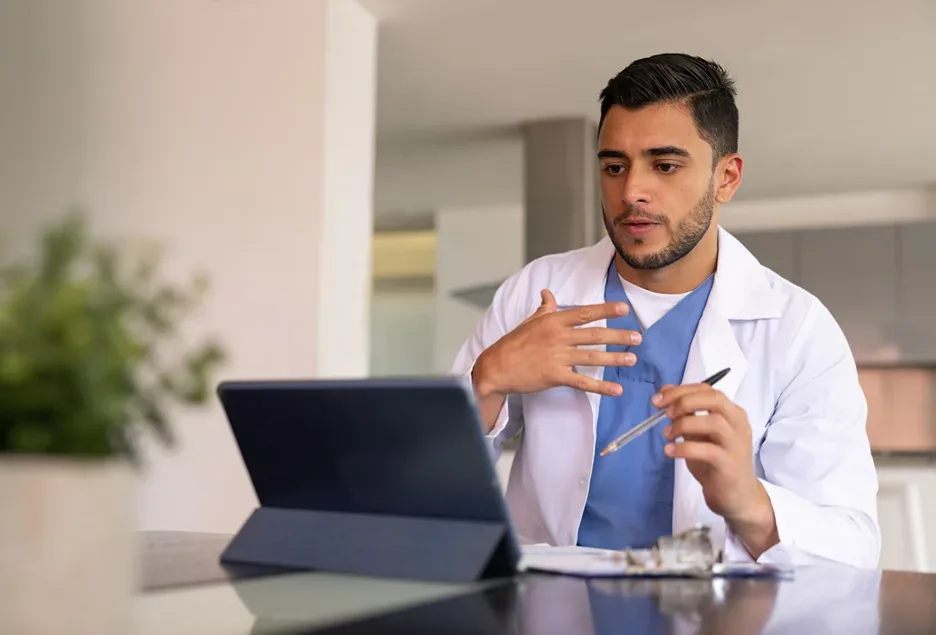 A physician conducting a telemedicine evaluation