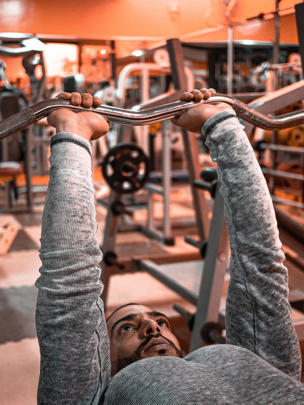 A man mid-workout at the gym, representative of staying strong and active at every age