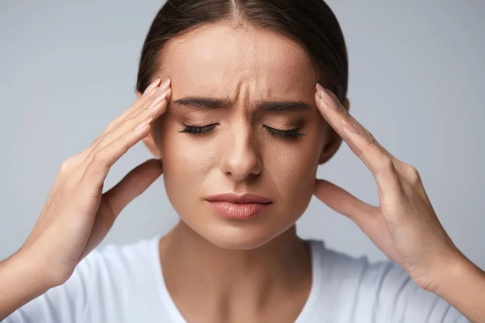 A patient experiencing chronic migraine pain