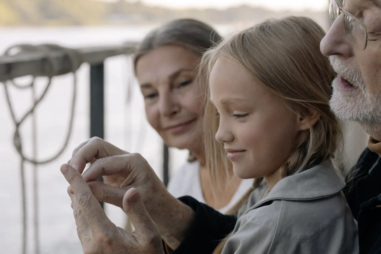 Three generations of a family spending time together outdoors