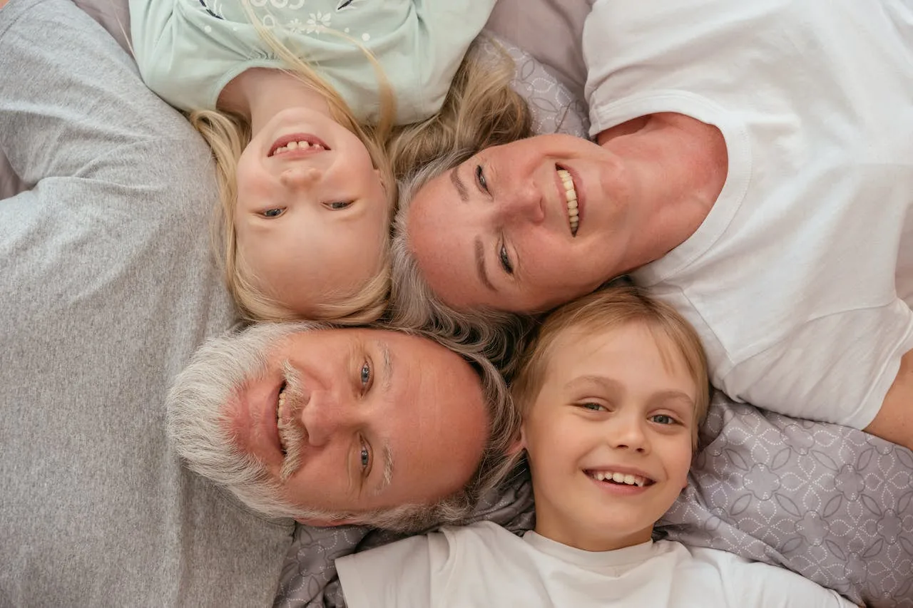 A multigenerational family together, reflecting the long-term relationships the practice builds across generations