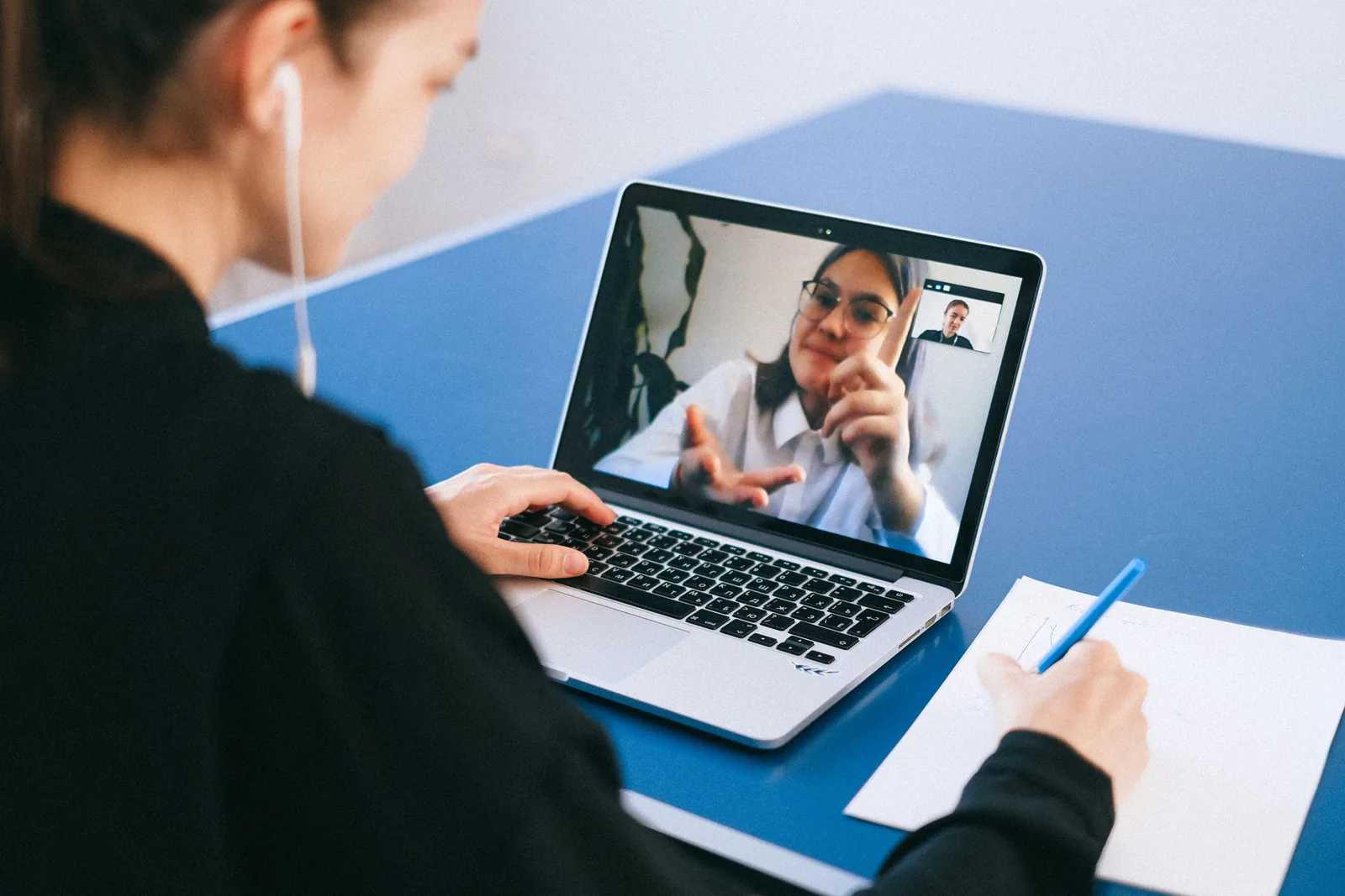 A patient in a video consultation discussing questions with their clinician, representative of getting real answers about medical MJ concerns